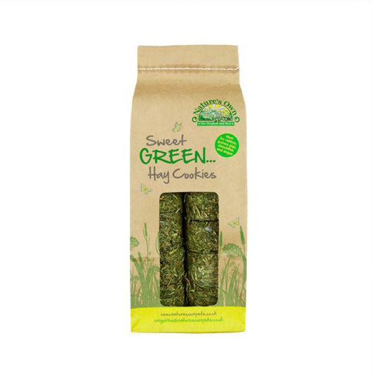 Hay cookies in brown packaging with a green grass design. A Sweet Green logo is at the top of the packaging.